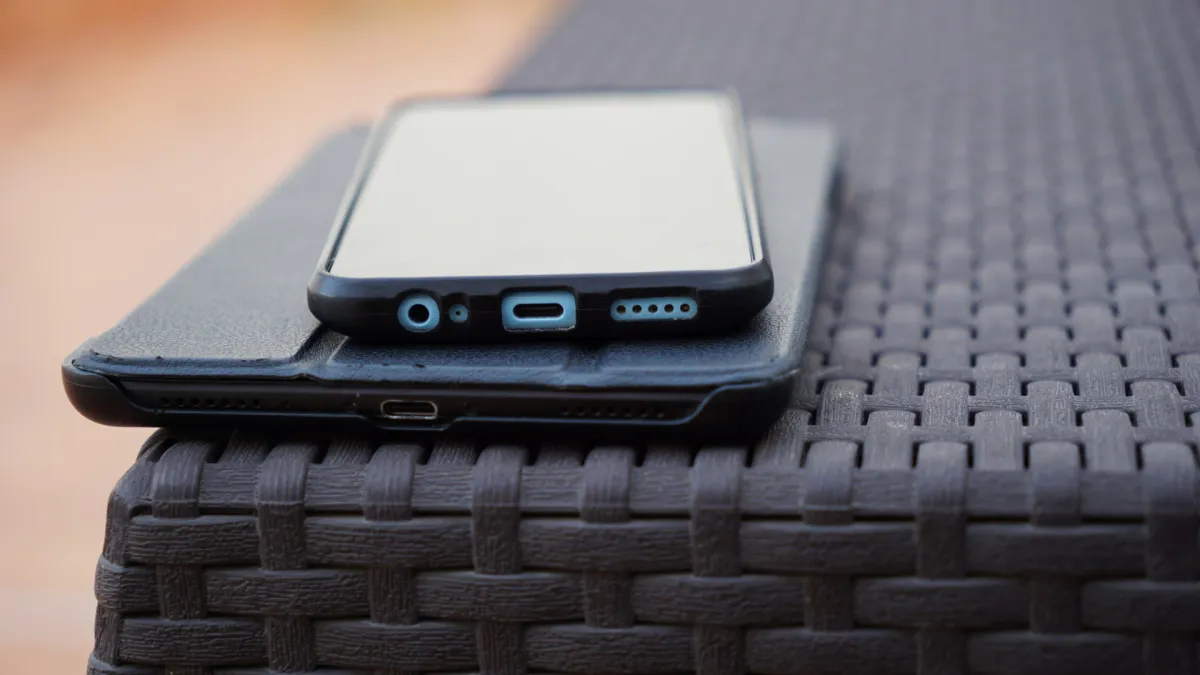 A smartphone resting on a tablet