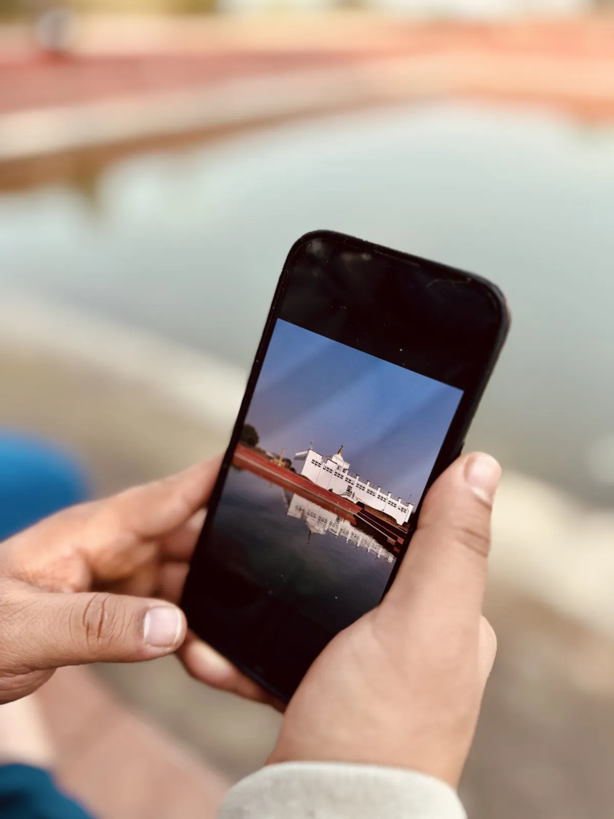 Two hands holding a smartphone